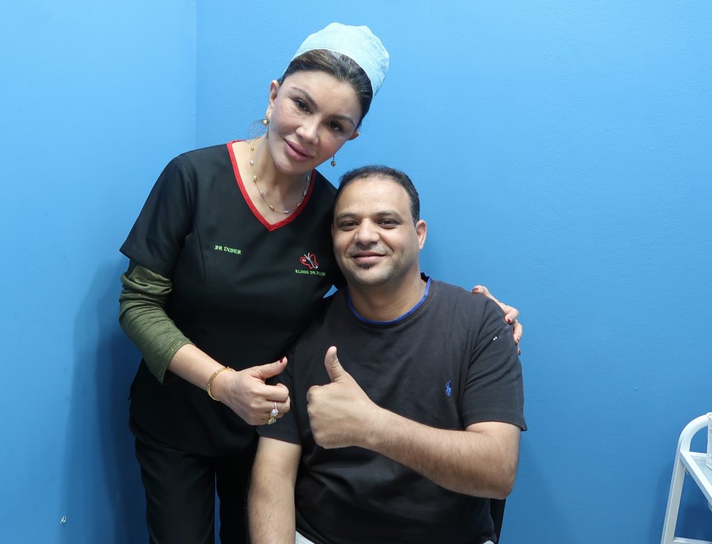 Dr Inder with one of Patient